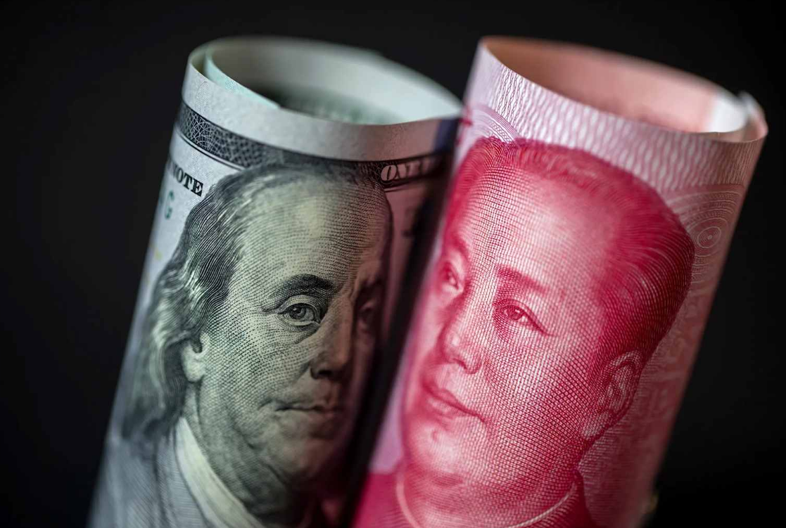 Asian currencies slide